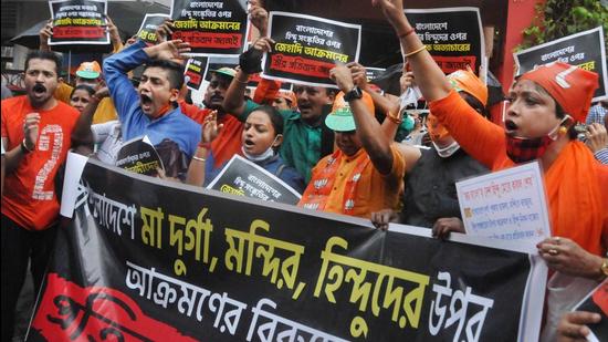 Kolkata: BJP activists protest against alleged attack on Hindus in Bangladesh, in front of Bharat Sevashram Sangha headquarters in Kolkata, Monday, (PTI) Kolkata: BJP activists protest against alleged attack on Hindus in Bangladesh, in front of Bharat Sevashram Sangha headquarters in Kolkata, Monday, (PTI)