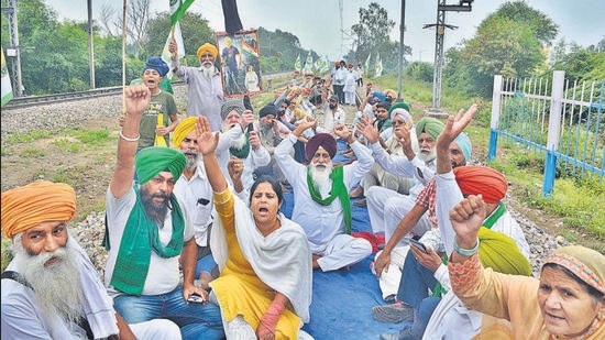 Farmers protesting at the railway tracks in Raipur Kalan village, Chandigarh, in support of Samyukta Kisan Morcha’s “Rail Roko” call on Monday. (Sant Arora/HT)