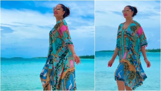 Bipasha Basu gets clicked in front of a picturesque backdrop in the Maldives.(Instagram/@bipashabasusinghgrover)