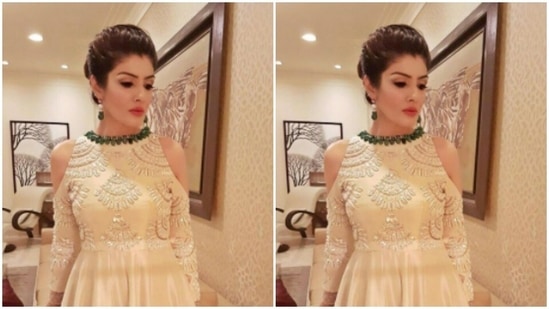 Raveena Tandon’s festive wardrobe is drool-worthy. A few days back, she posed in a white and gold long dress and made us dream.(Instagram/@officialraveenatandon)