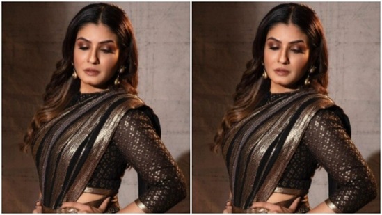In a black and gold saree, Raveena set major festive fashion goals for us.(Instagram/@officialraveenatandon)
