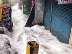 Water gushes out from Nainital Lake as it overflows and floods the streets due to incessant rainfall, in Nainital on Tuesday.(ANI ) Water gushes out from Nainital Lake as it overflows and floods the streets due to incessant rainfall, in Nainital on Tuesday.(ANI )