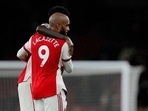 Arsenal's Alexandre Lacazette, front is hugged by Arsenal's Thomas Partey at the end of an English Premier League soccer match between Arsenal and Crystal Palace at the Emirates Stadium in London, England, Monday Oct. 18, 2021. (AP Photo/Alastair Grant)(AP) Arsenal's Alexandre Lacazette, front is hugged by Arsenal's Thomas Partey at the end of an English Premier League soccer match between Arsenal and Crystal Palace at the Emirates Stadium in London, England, Monday Oct. 18, 2021. (AP Photo/Alastair Grant)(AP)