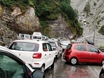 Vehicles are stuck at the Badrinath highway after it was blocked due to the falling of debris following heavy rain in Chamoli in Uttarakhand.&nbsp;
