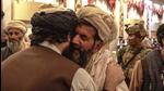 Several photos showed Haqqani embracing relatives of the suicide bombers and praying at the meeting. (TWITTER/@Saeed Khosty.) Several photos showed Haqqani embracing relatives of the suicide bombers and praying at the meeting. (TWITTER/@Saeed Khosty.)