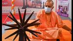 UP chief minister Yogi Adityanath at the inauguration of Khadi Festival and Silk Expo-2021, in Lucknow, Tuesday, (PTI photo)