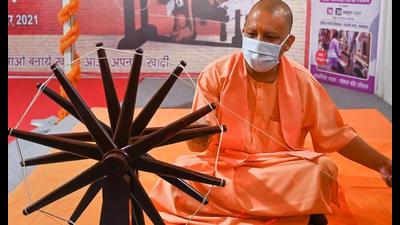 UP chief minister Yogi Adityanath at the inauguration of Khadi Festival and Silk Expo-2021, in Lucknow, Tuesday, (PTI photo) UP chief minister Yogi Adityanath at the inauguration of Khadi Festival and Silk Expo-2021, in Lucknow, Tuesday, (PTI photo)