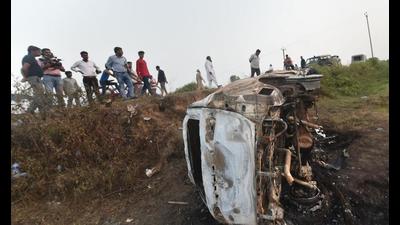 People take a look at the overturned SUV that was destroyed in violence during farmers’ protest, at Tikunia area of Lakhimpur Kheri district (PTI file photo) People take a look at the overturned SUV that was destroyed in violence during farmers’ protest, at Tikunia area of Lakhimpur Kheri district (PTI file photo)