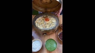 The image shows the huge momo garnished with gold in Mumbai. (Instagram/@whatafoodiegirl)