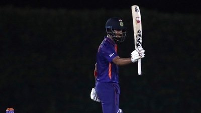 India's KL Rahul raises his bat to celebrate scoring fifty runs during the Cricket Twenty20 World Cup warm-up match between India and England in Dubai, UAE, Monday, Oct. 18, 2021. (AP Photo/Aijaz Rahi) (AP) India's KL Rahul raises his bat to celebrate scoring fifty runs during the Cricket Twenty20 World Cup warm-up match between India and England in Dubai, UAE, Monday, Oct. 18, 2021. (AP Photo/Aijaz Rahi) (AP)
