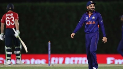 India's captain Virat Kohli, right, reacts after a delivery against England's Jos Buttler by his teammate during the Cricket Twenty20 World Cup warm-up match between England and India in Dubai, UAE, Monday, Oct. 18, 2021. (AP Photo/Aijaz Rahi) (AP) India's captain Virat Kohli, right, reacts after a delivery against England's Jos Buttler by his teammate during the Cricket Twenty20 World Cup warm-up match between England and India in Dubai, UAE, Monday, Oct. 18, 2021. (AP Photo/Aijaz Rahi) (AP)