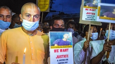 Iskcon members in Kolkata protest against the violence in Bangladesh, on Sunday (PTI)