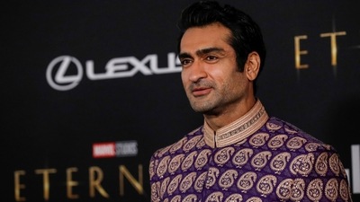 Kumail Nanjiani smiles at the premiere for Eternals. (REUTERS) 