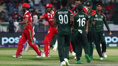 Oman's batsman Jatinder Singh, left, the crease after being dismissed by Bangladesh's Shakib Al Hasan during the Cricket Twenty20 World Cup first round match between Oman and Bangladesh in Muscat, Oman, Tuesday, Oct. 19, 2021. (AP) Oman's batsman Jatinder Singh, left, the crease after being dismissed by Bangladesh's Shakib Al Hasan during the Cricket Twenty20 World Cup first round match between Oman and Bangladesh in Muscat, Oman, Tuesday, Oct. 19, 2021. (AP)