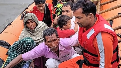 Udham Singh Nagar: National Disaster Response Force (NDRF) personnel rescue people stranded in floodwaters in Udham Singh Nagar, Uttarakhand, (PTI) Udham Singh Nagar: National Disaster Response Force (NDRF) personnel rescue people stranded in floodwaters in Udham Singh Nagar, Uttarakhand, (PTI)
