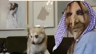 Woman wears Halloween mask to prank her dogs. (Instagram/@lifewithkleekai) Woman wears Halloween mask to prank her dogs. (Instagram/@lifewithkleekai)