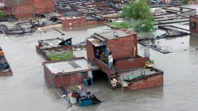 Houses get partially submerged in floodwater due to incessant rainfall, in Rudrapur, Uttarakhand, on Tuesday. (ANI) Houses get partially submerged in floodwater due to incessant rainfall, in Rudrapur, Uttarakhand, on Tuesday. (ANI)
