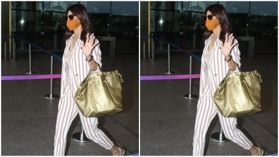 Shilpa wore an ochre tank top and teamed it with the striped shirt. (HT Photos/Varinder Chawla) Shilpa wore an ochre tank top and teamed it with the striped shirt. (HT Photos/Varinder Chawla)