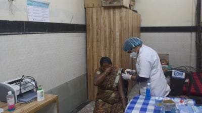 A beneficiary gets vaccinated in Pune, on Monday. As of Tuesday, Pune district has reported 367 new Covid-19 cases and three deaths due to the infection. (SHANKAR NARAYAN/HT)