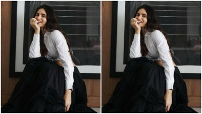 Gabriella posed in her ‘all time favourite” white shirt. The full-sleeved white shirt is cropped and has a tie back detail. She added a long black tutu skirt to it and sat for the cameras. (Instagram/@gabriellademetriades) Gabriella posed in her ‘all time favourite” white shirt. The full-sleeved white shirt is cropped and has a tie back detail. She added a long black tutu skirt to it and sat for the cameras. (Instagram/@gabriellademetriades)