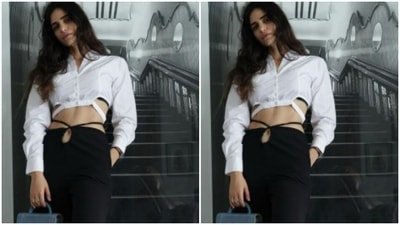 She styled her favourite cropped white shirt with a pair of black trousers with a tie back detail. (Instagram/@gabriellademetriades) She styled her favourite cropped white shirt with a pair of black trousers with a tie back detail. (Instagram/@gabriellademetriades)