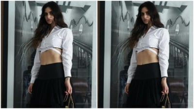 Gabriella teamed her shirt with a black long skirt and accessorised her look with a black sling bag. (Instagram/@gabriellademetriades) Gabriella teamed her shirt with a black long skirt and accessorised her look with a black sling bag. (Instagram/@gabriellademetriades)