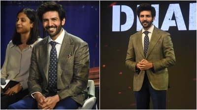 Kartik Aaryan accompanied his co-star looking dapper in a tailored suit set. The actor wore a check print brown blazer with notch lapel collars, double pockets, and a pocket square. (HT Photo/Varinder Chawla) Kartik Aaryan accompanied his co-star looking dapper in a tailored suit set. The actor wore a check print brown blazer with notch lapel collars, double pockets, and a pocket square. (HT Photo/Varinder Chawla)