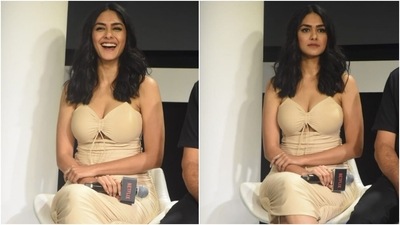 The figure-hugging silhouette of Mrunal's dress accentuated her curves aesthetically. The gathered details and asymmetric hemline added to its sensuous charm. For accessories, the star chose rings and embellished strappy peep-toe Louboutin pumps. (HT Photo/Varinder Chawla) The figure-hugging silhouette of Mrunal's dress accentuated her curves aesthetically. The gathered details and asymmetric hemline added to its sensuous charm. For accessories, the star chose rings and embellished strappy peep-toe Louboutin pumps. (HT Photo/Varinder Chawla)
