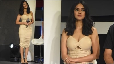 Mrunal chose a chic nude-coloured ensemble for the special occasion. Her calf-length dress came with a plunging sweetheart neckline, spaghetti straps, a cut-out detail on the front, and a ribbon tie on the torso. (HT Photo/Varinder Chawla) Mrunal chose a chic nude-coloured ensemble for the special occasion. Her calf-length dress came with a plunging sweetheart neckline, spaghetti straps, a cut-out detail on the front, and a ribbon tie on the torso. (HT Photo/Varinder Chawla)