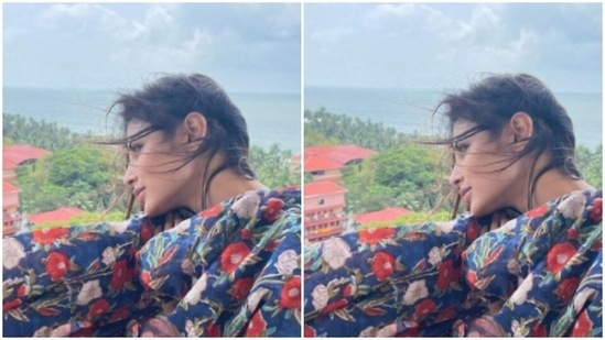 The actor let her open tresses play to the wind from the sea and the backwaters as she posed for the camera.(Instagram/@imouniroy)
