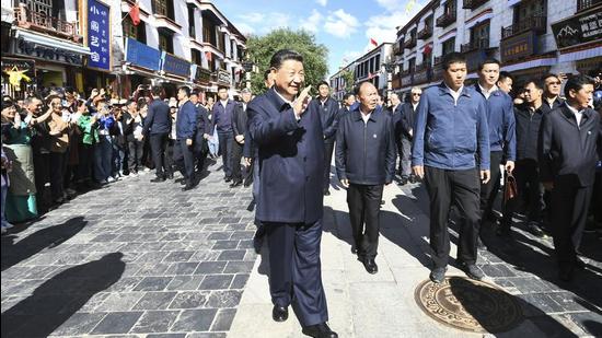 In this July 22, 2021 photo, China’s President Xi Jinping is seen visiting Barkhor Street in Lhasa, Tibet. A top CPC leader sanctioned by the US for rights violation in Xinjiang has been appointed as head of the Tibet region. (AP/File)