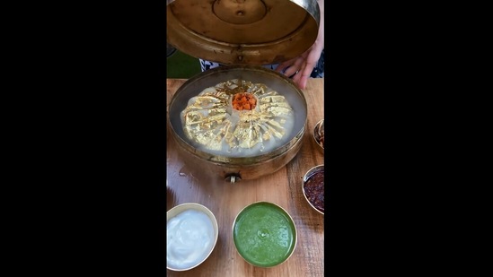 The image shows the huge momo garnished with gold in Mumbai.(Instagram/@whatafoodiegirl)