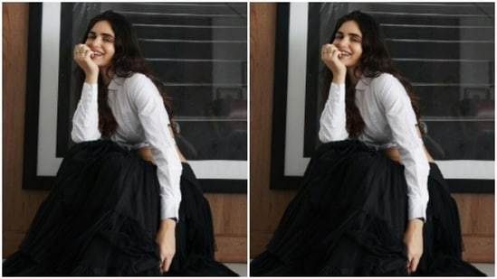 Gabriella posed in her ‘all time favourite” white shirt. The full-sleeved white shirt is cropped and has a tie back detail. She added a long black tutu skirt to it and sat for the cameras.(Instagram/@gabriellademetriades)