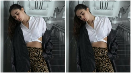 The one where Gabriella is party ready in a white shirt and a pair of animal print trousers. She teamed her attire with a black and white animal print sling bag.(Instagram/@gabriellademetriades)