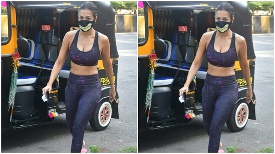 She teamed a black and violet striped sports bra with a pair of gym trousers of the same print.(HT Photos/Varinder Chawla)