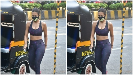 Malaika pulled her straight tresses to the back and tied it in a clean bun.(HT Photos/Varinder Chawla)