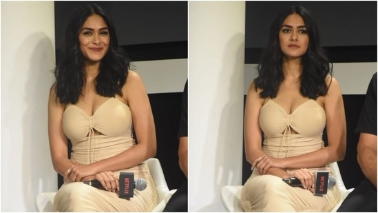 Mrunal left her locks open in a middle-parting with the dress and styled them in soft curls. Glossy pink lip shade, blushed cheeks, glowing skin, winged eyeliner, mascara-laden lashes, and beaming highlighter completed her beauty picks.(HT Photo/Varinder Chawla)