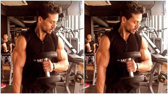 Tiger Shroff shared a video of himself in the gym, working on his arm muscles by working out with weights.(Instagram/@tigerjackieshroff)