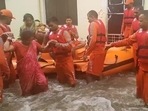 An NDRF team carries out rescue operations at several waterlogged areas in Rudrapur, Uttarakhand.(ANI)