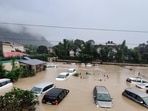 Uttarakhand Congress and AAP said the PS Dhami-led BJP government should have taken proactive steps after IMD’s weather forecast. In this photo, submerged cars are seen at a flooded hotel resort at the Jim Corbett National Park in Uttarakhand on Tuesday. (AP)