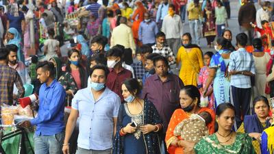 Visitors disregarding the need for masks and social distancing at a fair organised on the occasion of Valmiki Jayanti in Sector 24, Chandigarh, on Wednesday. (Keshav Singh/HT) Visitors disregarding the need for masks and social distancing at a fair organised on the occasion of Valmiki Jayanti in Sector 24, Chandigarh, on Wednesday. (Keshav Singh/HT)