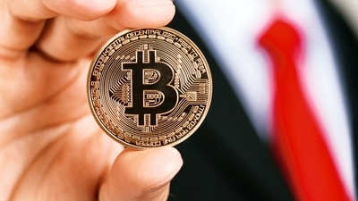 The news electrified demand for the cryptocurrency, which scaled an all-time pinnacle of $66,976 in London on Wednesday. (MINT_PRINT) The news electrified demand for the cryptocurrency, which scaled an all-time pinnacle of $66,976 in London on Wednesday. (MINT_PRINT)