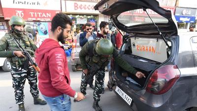 Security personnel conduct checks in Kashmir on Wednesday. (Waseem Andrabi/HT photo) Security personnel conduct checks in Kashmir on Wednesday. (Waseem Andrabi/HT photo)
