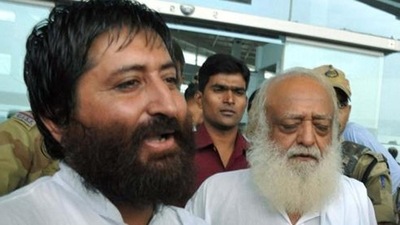Self-styled godman Asaram Bapu and his son Narayan Sai are both accused of sexual assault. Sai was convicted in a rape case by a Surat court in April 2019 on a complaint by two women that they were raped between 2002 and 2005 at a Surat ashram run by him and his father. (PTI) Self-styled godman Asaram Bapu and his son Narayan Sai are both accused of sexual assault. Sai was convicted in a rape case by a Surat court in April 2019 on a complaint by two women that they were raped between 2002 and 2005 at a Surat ashram run by him and his father. (PTI)