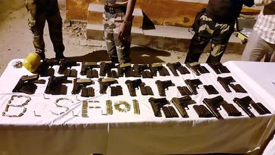 BSF and Punjab Police foiled a weapon smuggling attempt and seized a big cache of arms and ammunitions, at BS Fence, in Amritsar on Tuesday. (ANI) BSF and Punjab Police foiled a weapon smuggling attempt and seized a big cache of arms and ammunitions, at BS Fence, in Amritsar on Tuesday. (ANI)