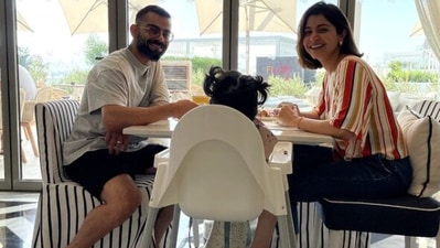 Anushka Sharma with Virat Kohli and Vamika.
