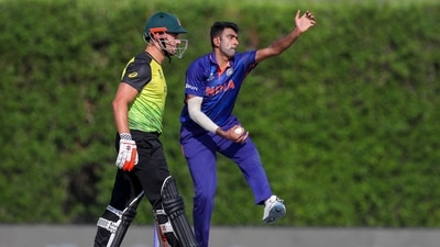 India's Ravichandran Ashwin bowls as Australia's Marcus Stoinis, left, watches during the Cricket Twenty20 World Cup warm-up match between India and Australia in Dubai, UAE, Wednesday, Oct. 20, 2021. (AP) India's Ravichandran Ashwin bowls as Australia's Marcus Stoinis, left, watches during the Cricket Twenty20 World Cup warm-up match between India and Australia in Dubai, UAE, Wednesday, Oct. 20, 2021. (AP)