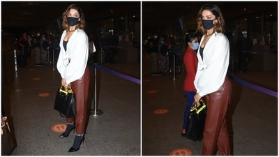 Deepika, who is married to Ranveer Singh, arrived at the Mumbai airport dressed in a chic ensemble that included a white shirt, faux leather pants, and a bralette. Serving boss lady vibes, Deepika looked ultra-glam in the attire. (HT Photo/Varinder Chawla) Deepika, who is married to Ranveer Singh, arrived at the Mumbai airport dressed in a chic ensemble that included a white shirt, faux leather pants, and a bralette. Serving boss lady vibes, Deepika looked ultra-glam in the attire. (HT Photo/Varinder Chawla)