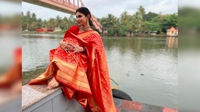 Mouni Roy is the epitome of elegance and royalty in this stunning red Banarasi saree. (Instagram/@imouniroy) Mouni Roy is the epitome of elegance and royalty in this stunning red Banarasi saree. (Instagram/@imouniroy)