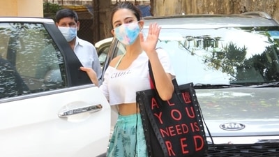 Sara Ali Khan was snapped in shorts and a crop top outside the gym. (Varinder Chawla) Sara Ali Khan was snapped in shorts and a crop top outside the gym. (Varinder Chawla)